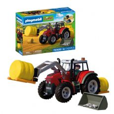 Gro�er Traktor mit Heuballen